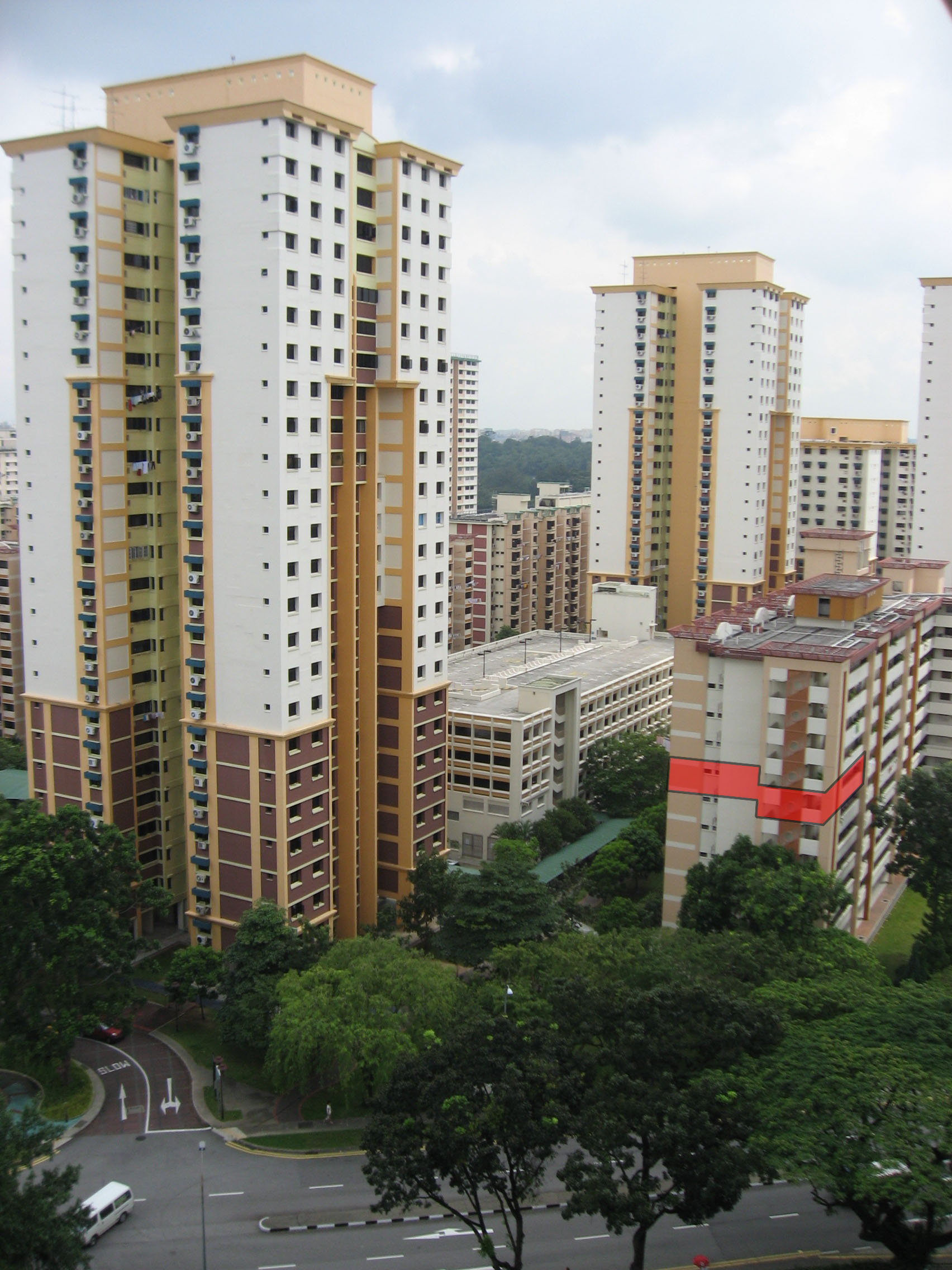 Block 12, Toa Payoh Lorong 7, at right, with the former flat location marked in red by the photographer, in November 2008.