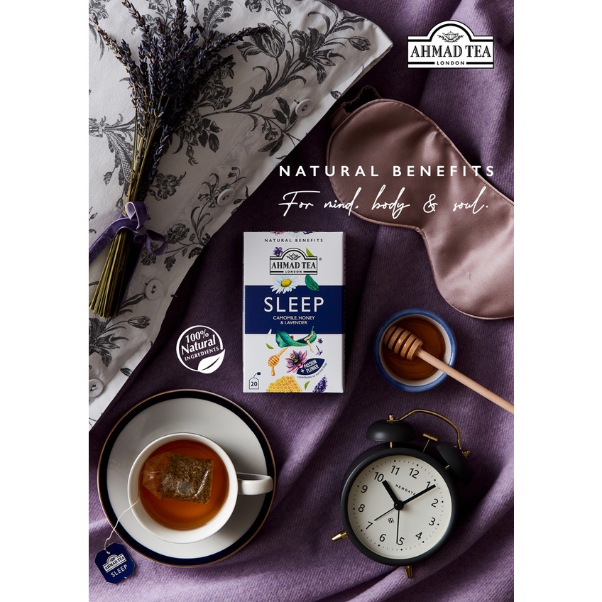 Ahmad Tea Sleep infusion with a cup and evening accessories